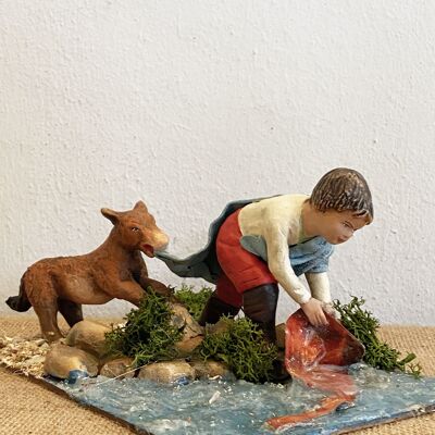 Child with dog, figure of the nativity scene
