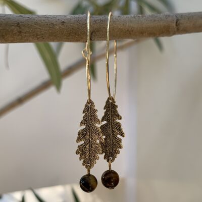 Golden hoop earrings with oak leaves and fine tiger's eye stone