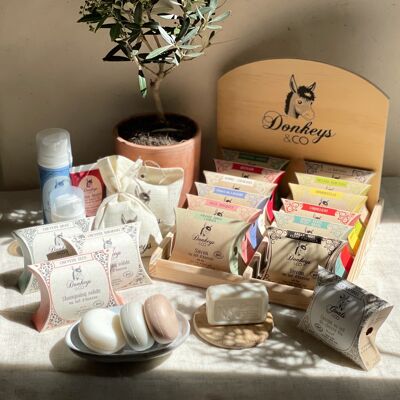 Wooden display for DONKEYS & Co soaps and shampoos.