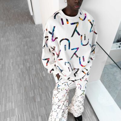 Non-binary Oversize-Sweatshirt mit buntem Allover-Print 100 % Bio-Baumwolle