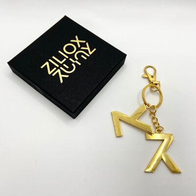 Schlüsselanhänger mit goldenem Logo