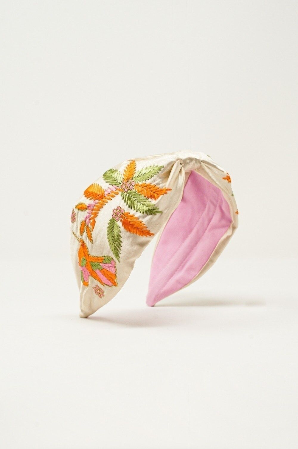 Besticktes Stirnband in oranger Farbe