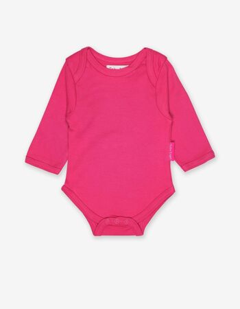 Body bébé rose en coton bio avec décolleté plongeant
