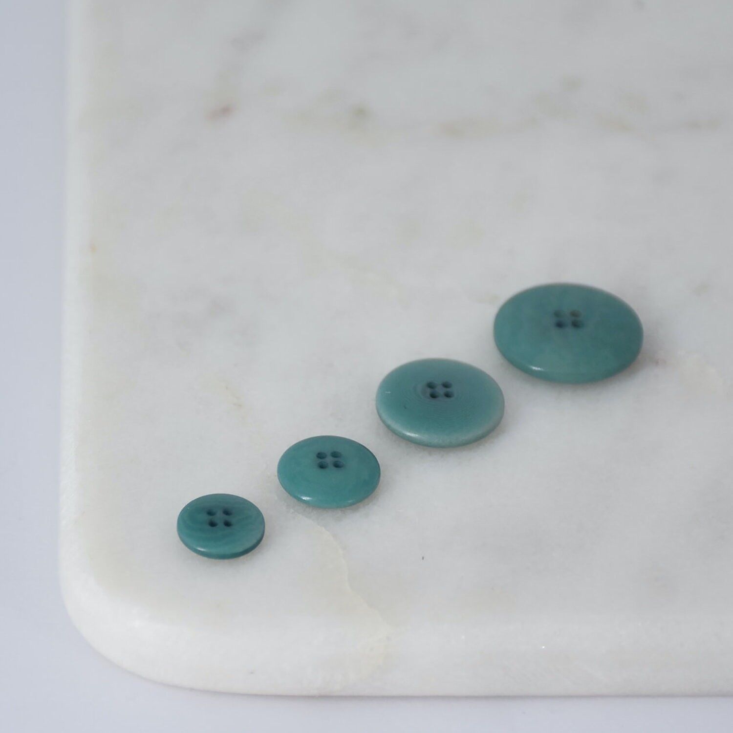 Bottoni in corozo di larice