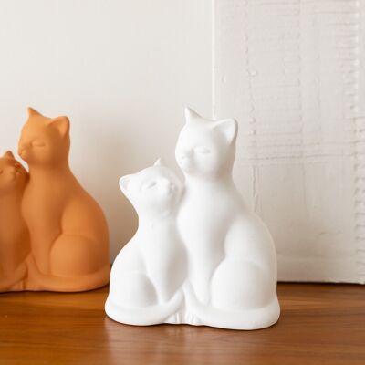 Gatti in ceramica
