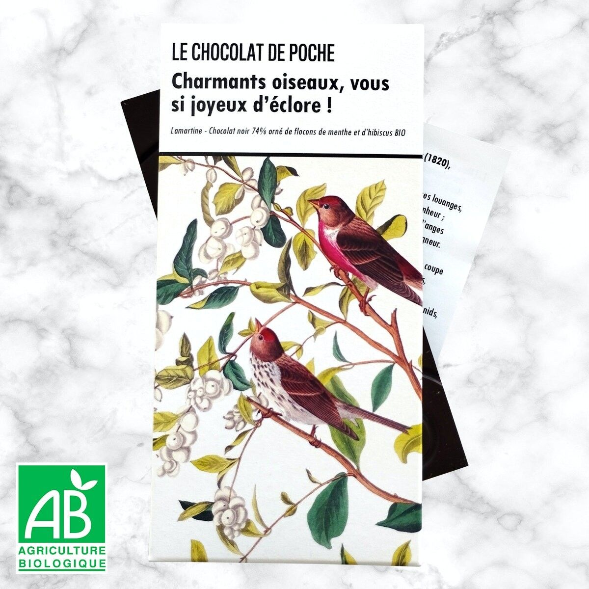 Barra de chocolate negro 74% adornada con menta orgánica y hojuelas de hibisco - Pájaros encantadores...