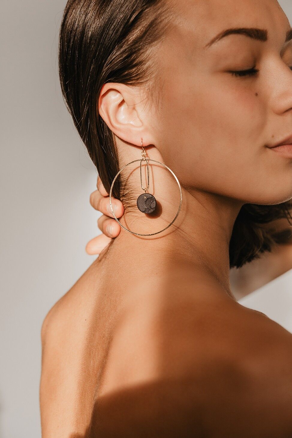 Oval porcelain hoop earring