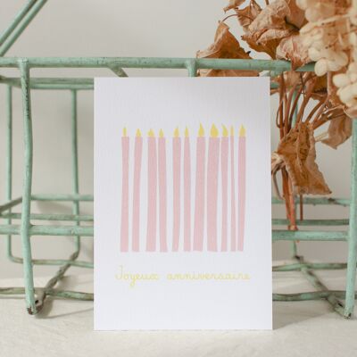 Cartolina di buon compleanno con candele rosa