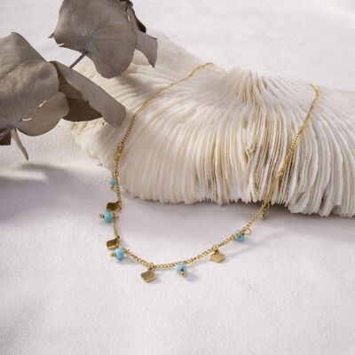 Golden necklace with mini blue pendants