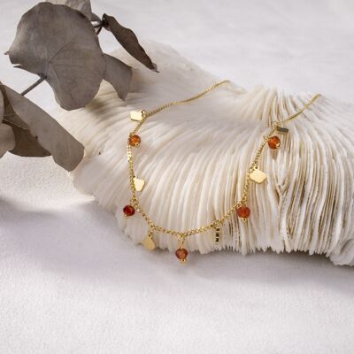 Golden necklace with mini red pendants