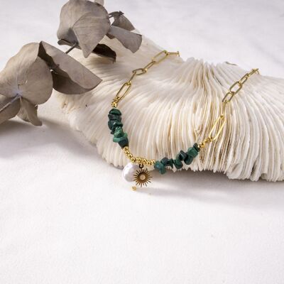Golden necklace with green pearls and sun pendant
