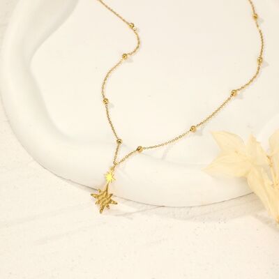 Golden necklace with star pendants