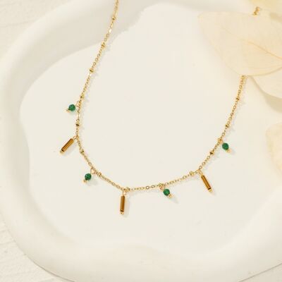 Golden necklace with green pendants
