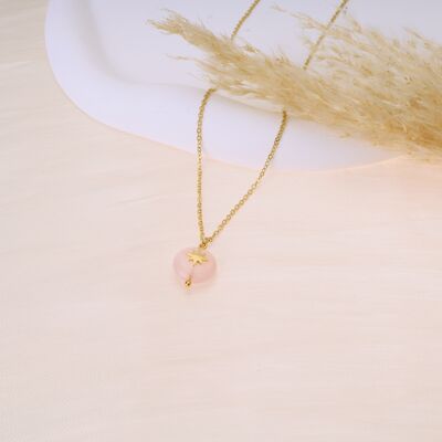 Golden necklace with star pendant and pink stone