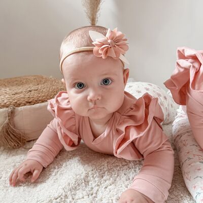 Pink bodysuit with ruffles