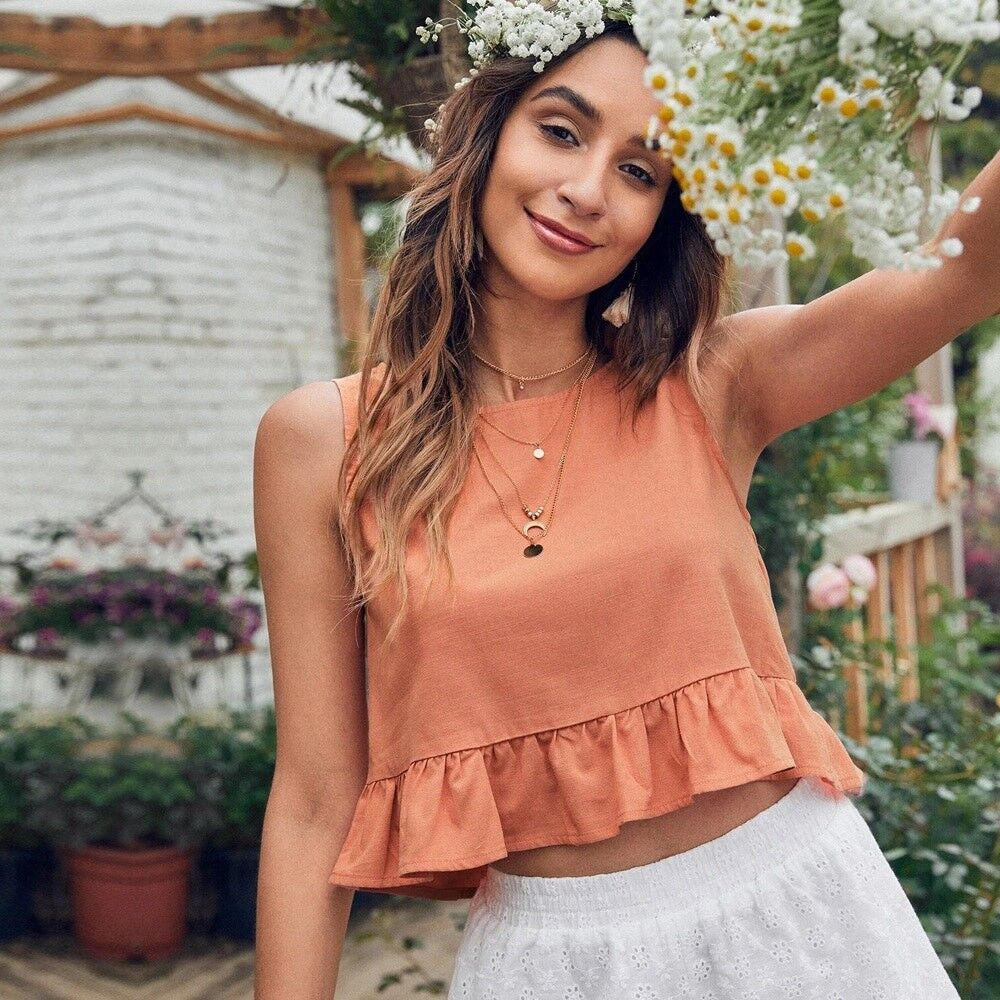 Camiseta sin mangas con volantes y cuello redondo