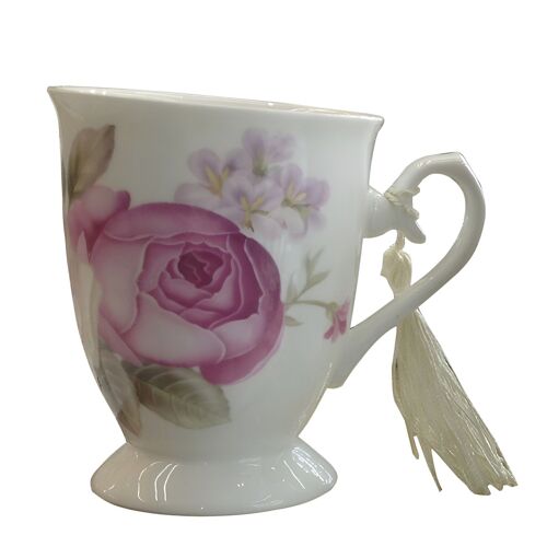 Ceramic mug with flowers in a gift box