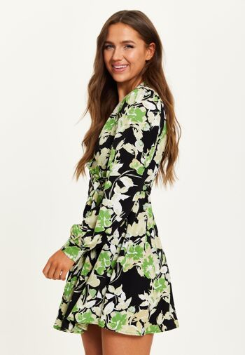 Mini robe portefeuille à imprimé floral vert liqueur avec manches longues en noir 33