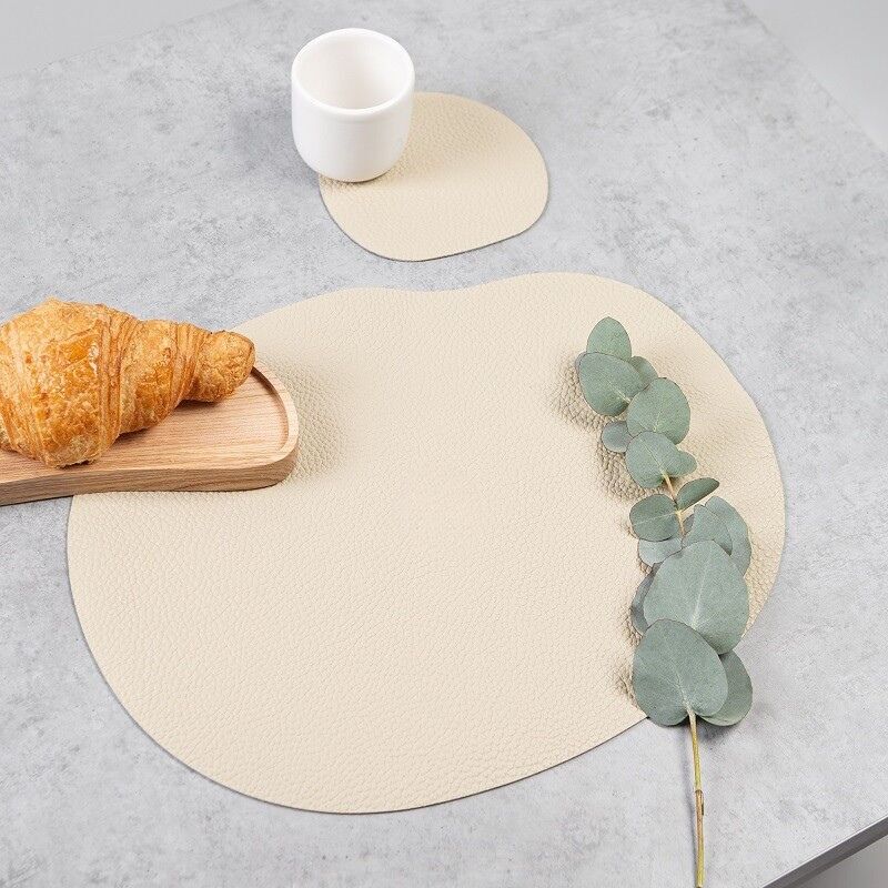 Tischset und Untersetzer aus Leder, Elfenbein MILLSTONES