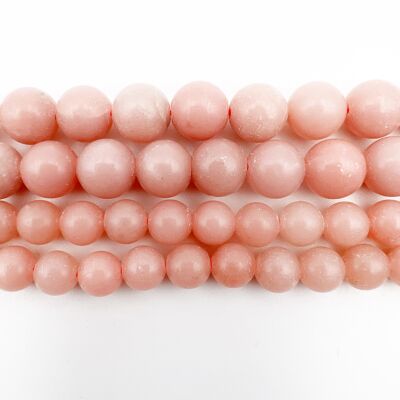 Row of 8mm pink aragonite stones