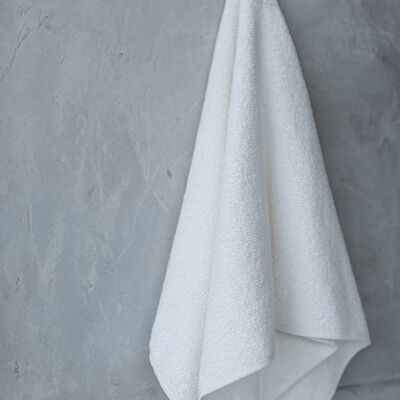 Asciugamano in spugna di canapa di colore bianco