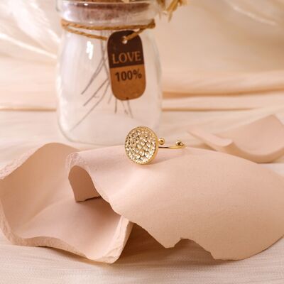 Adjustable golden ring with a golden plate