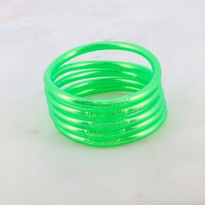 Fluorescent green thick Buddhist bangle with an engraved mantra "Happiness, Luck, Fortune and Love" in Thai