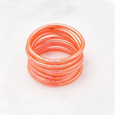 Thick coral Buddhist bangle with an engraved mantra "Happiness, Luck, Fortune and Love" in Thai