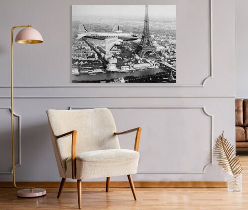 Quadro con fotografia d'epoca, stampa su tela: Aereo in volo sopra Parigi