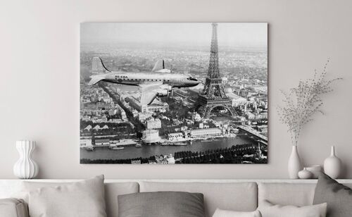 Quadro con fotografia d'epoca, stampa su tela: Aereo in volo sopra Parigi