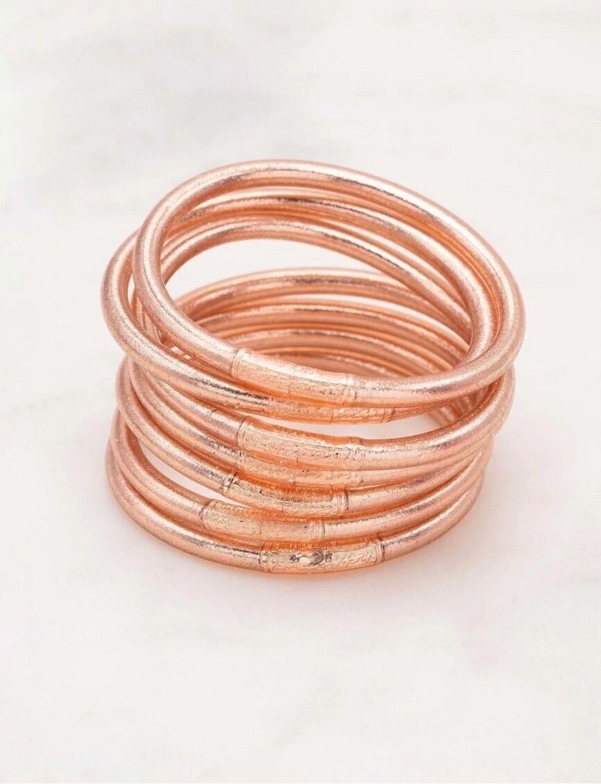 Gold bangles with on sale copper rod inside