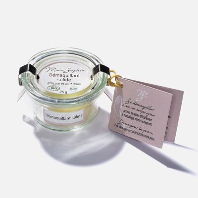 Organic solid make-up remover in its glass jar
