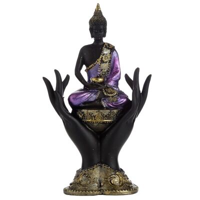 Buddha tailandese viola, oro e nero seduto tra le mani
