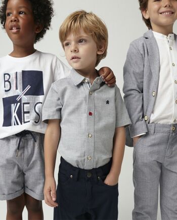 Chemise garçon bleu marine/blanc en simili coton uni, manches courtes. (2a-16a) 4