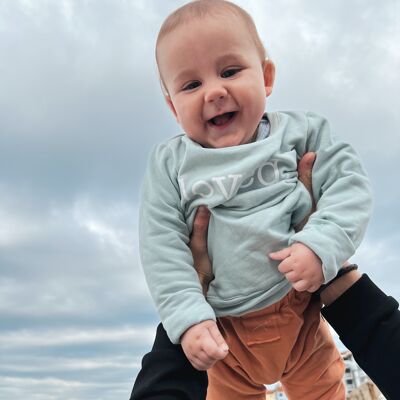 Maglione oversize per neonato bio leggero color acqua con stampa