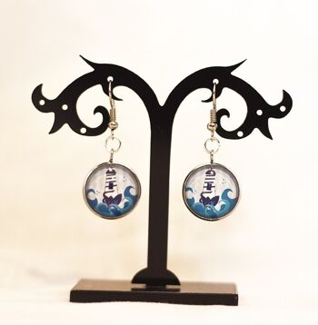 Boucles oreilles phare acier