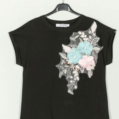 Embroidered flower t-shirt.