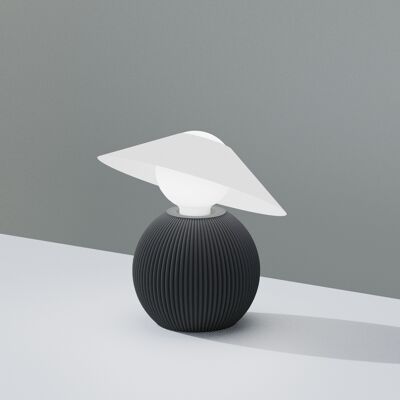Decorative minimalist eco design table lamp, "DAM". lady in lamp hat