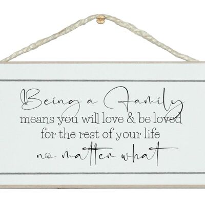 Being a family, you are loved. 2023 sign
