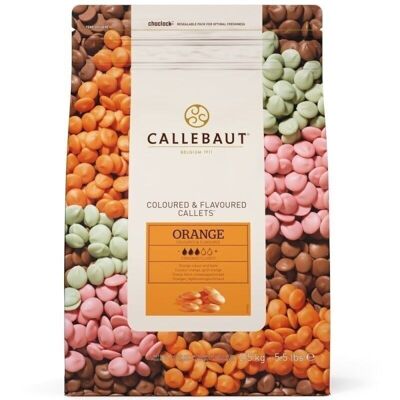 CALLEBAUT - CALLETS Naranja - Callets de color anaranjado y sabor cremoso con sabores a naranja y amargor pronunciado. Bolsa de 2,5 Kg.