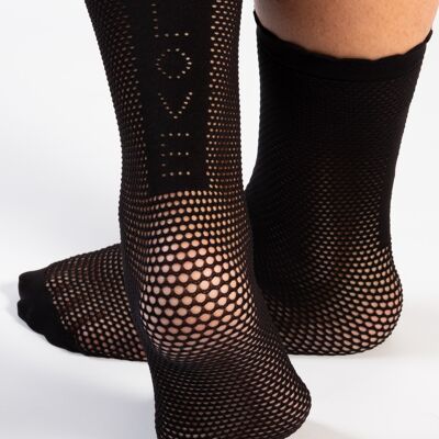 Women's fishnet stockings with love writing