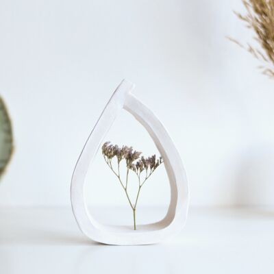 Ceramic holder with dried flower