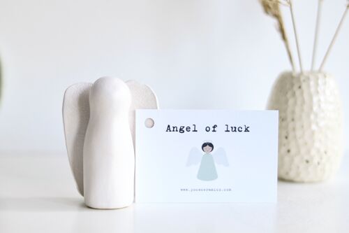Angel of luck made of ceramics