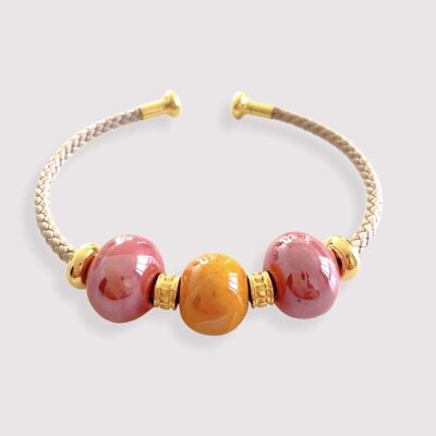 Bracelet adorned with enamelled ceramic beads in pink and orange