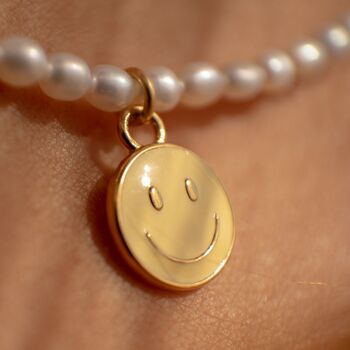 Collier de perles souriantes 4