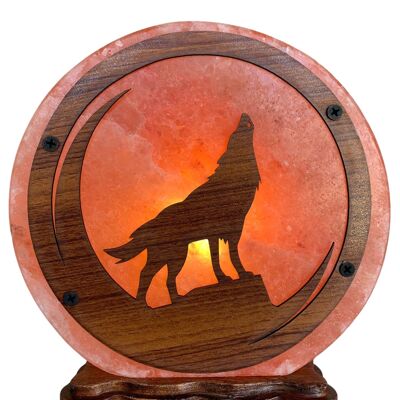 Round Himalayan salt lamp with Wolf background