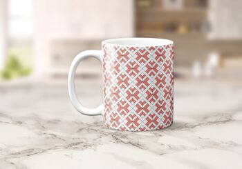 Tasse, tasse à thé ou à café à motif géométrique corail et blanc