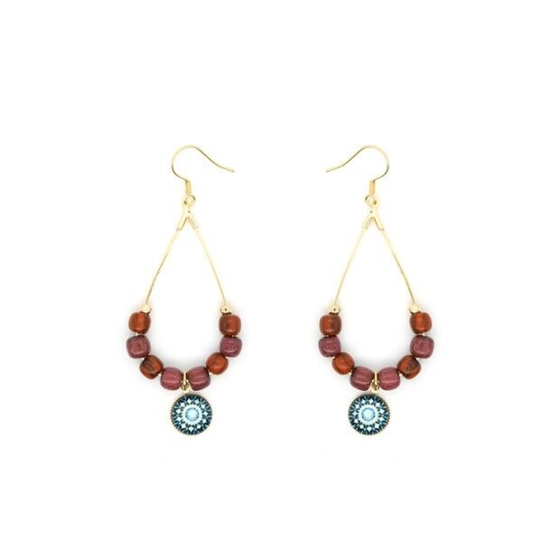 Ohrringe aus kubanischem Holz und Gold