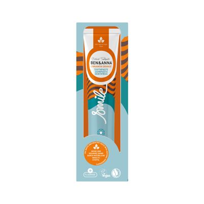 Tube de dentifrice orange cannelle