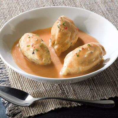 Lyonnaise-style dumplings - 380 g: Enhanced with a Savory Tomato Sauce and Accompanied by Rice.